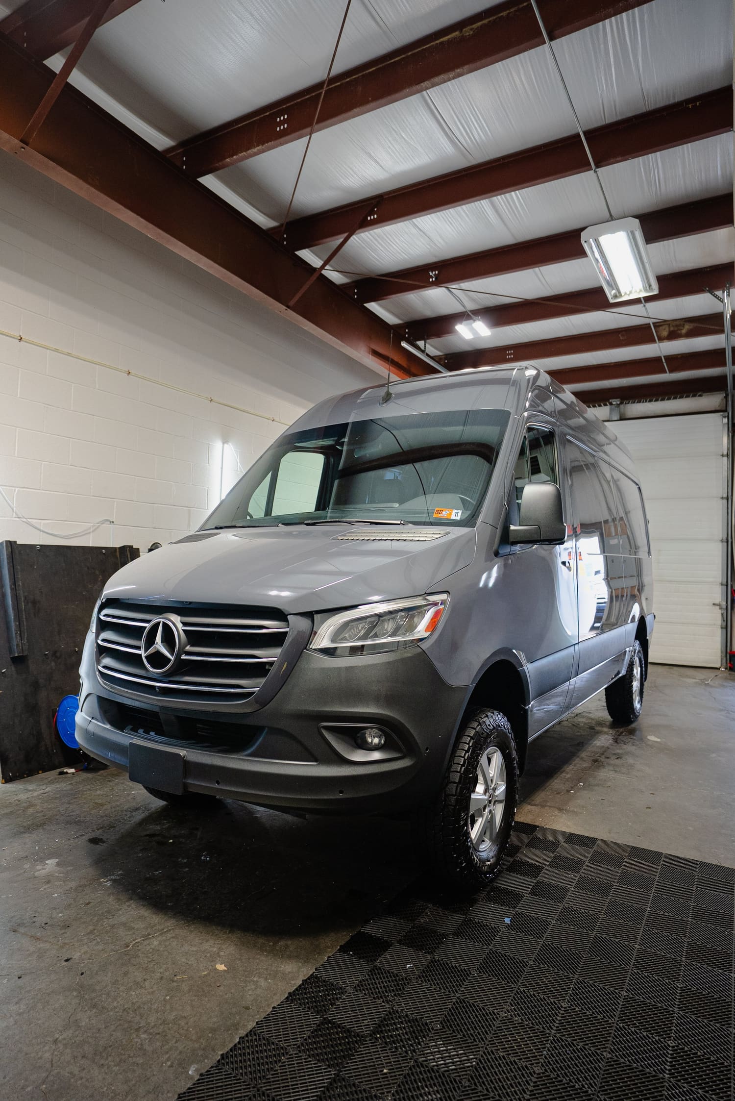 Gray Mercedes-Benz Sprinter van in the C4 bay