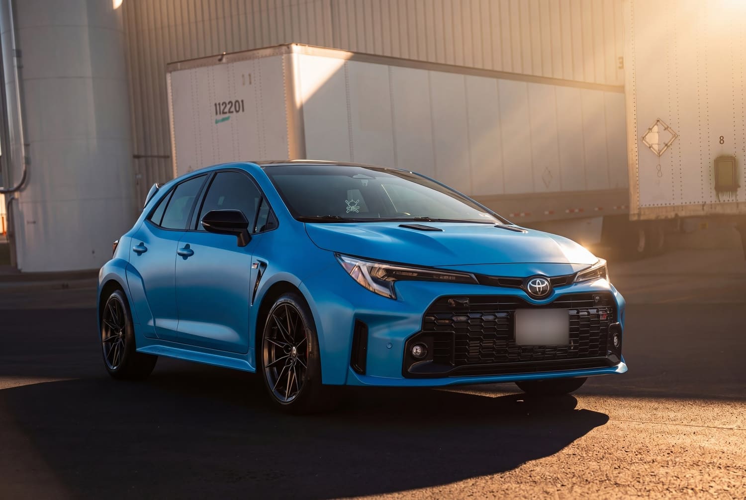 Blue Toyota GR Corolla in evening light